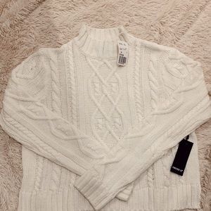 White mock neck sweater